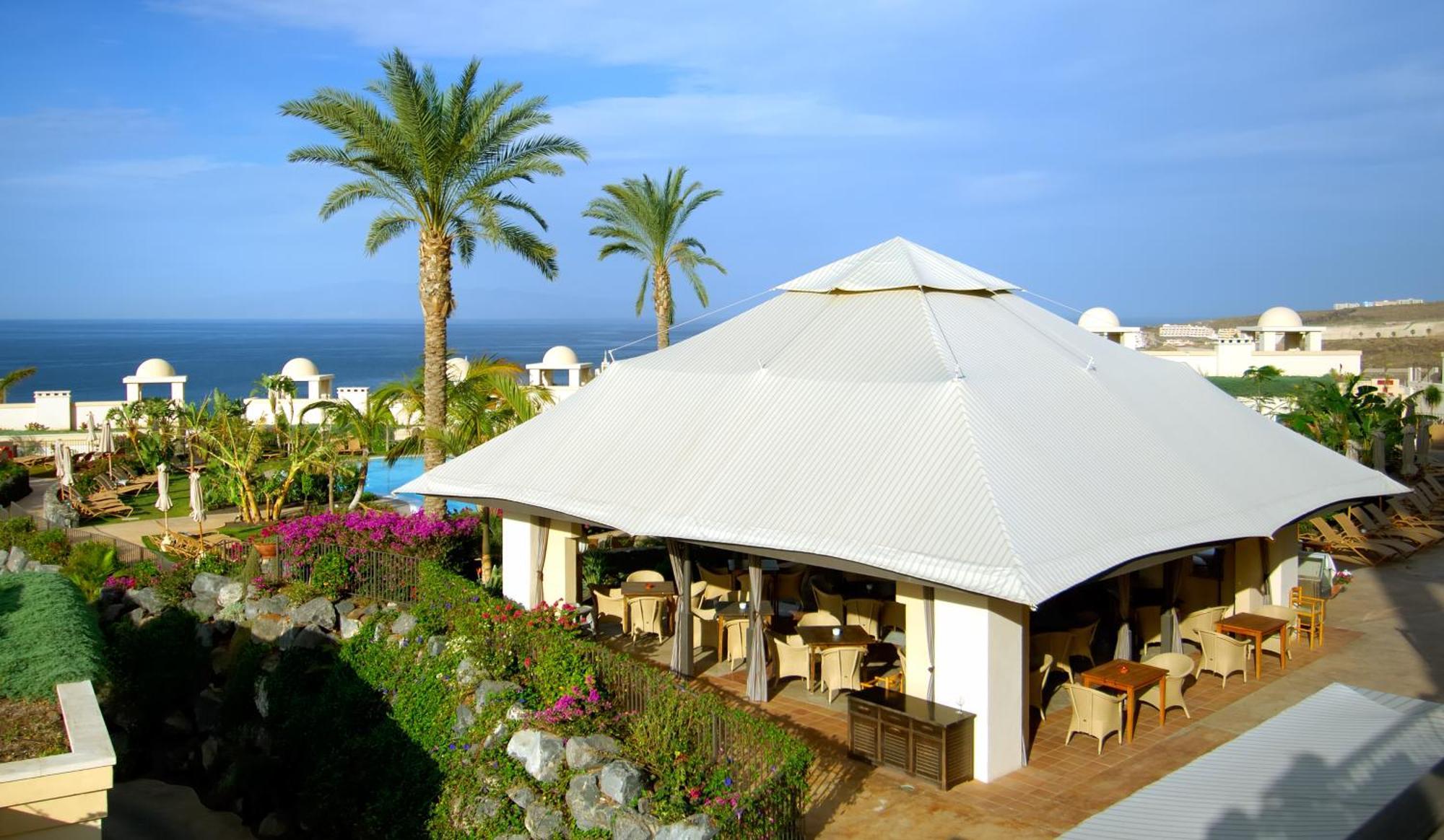 Vincci Seleccion La Plantacion Del Sur Otel Costa Adeje Restoran fotoğraf A restaurant in a hotel